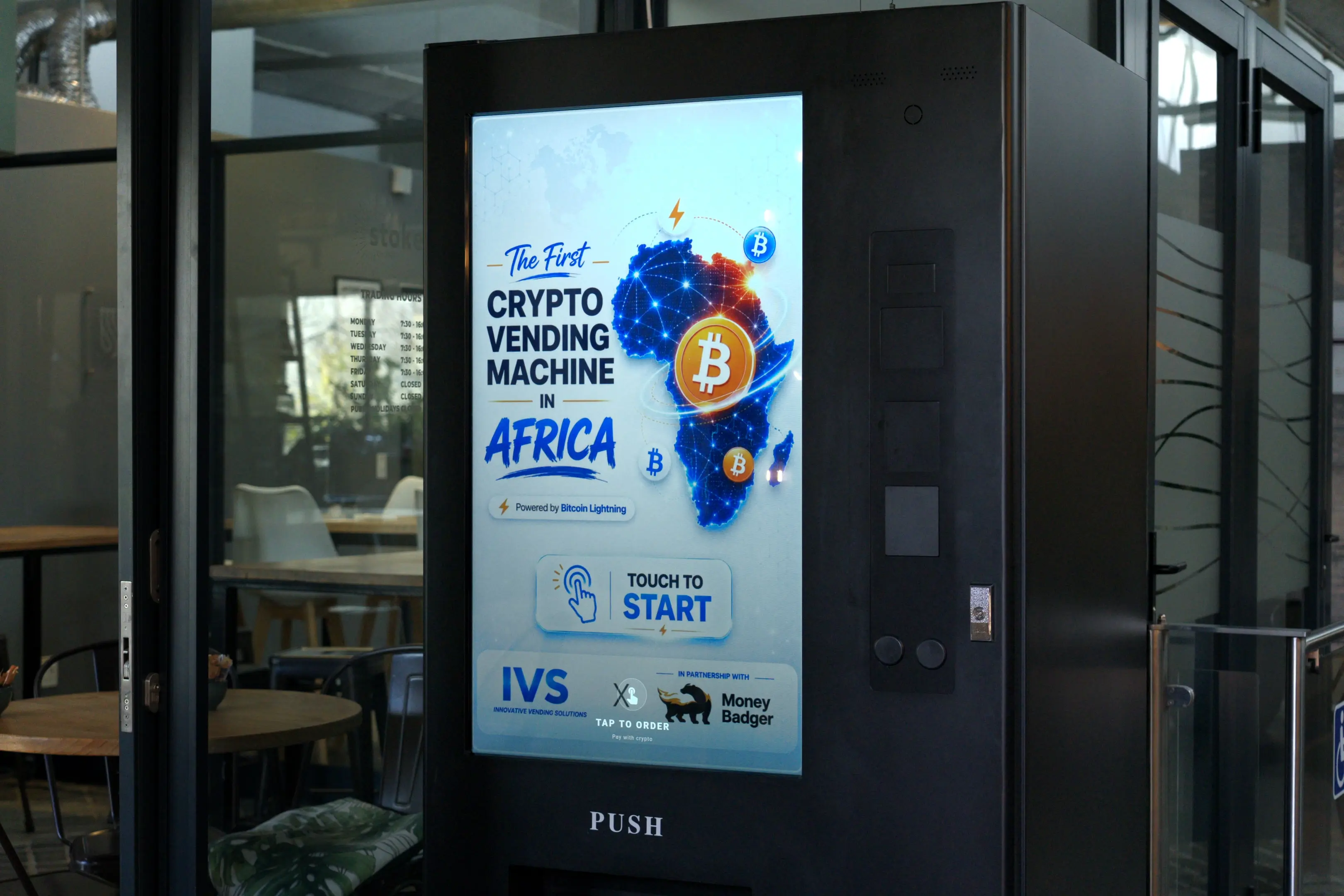 A Touch Media 4 machine displaying "The first crypto vending machine in Africa"